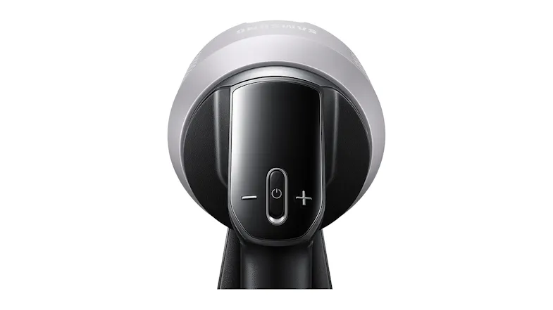 Close-up of a cordless vacuum’s top control panel showing the power button and plus-minus settings Close-up of a cordless vacuum’s top control panel showing the power button and plus-minus settings