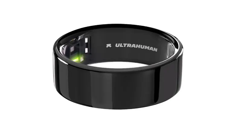 Close-up of the Ultrahuman Ring Air in Aster Black, showing inner sensors and branding Close-up of the Ultrahuman Ring Air in Aster Black, showing inner sensors and branding
