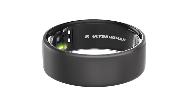 Close-up of the Ultrahuman Ring Air in matte grey, showing inner sensors and branding Close-up of the Ultrahuman Ring Air in matte grey, showing inner sensors and branding