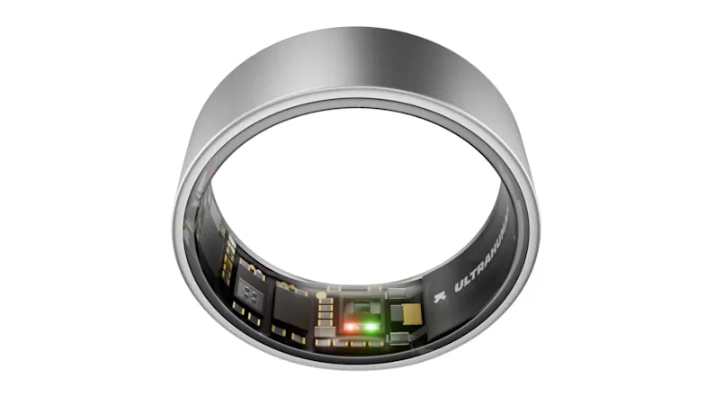 Tilted view of a ring showing internal circuitry and Ultrahuman logo on inner band Tilted view of a ring showing internal circuitry and Ultrahuman logo on inner band