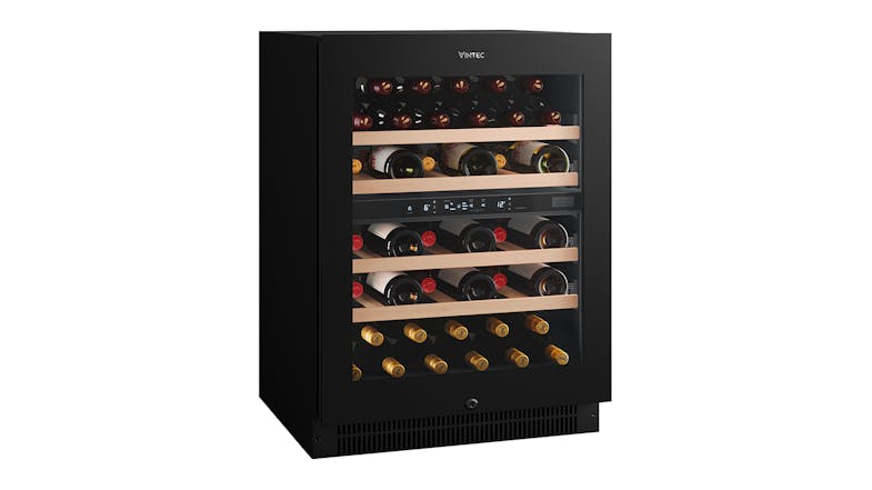 Angled view of a black Vintec dual zone wine fridge fully stocked with wine bottles Angled view of a black Vintec dual zone wine fridge fully stocked with wine bottles