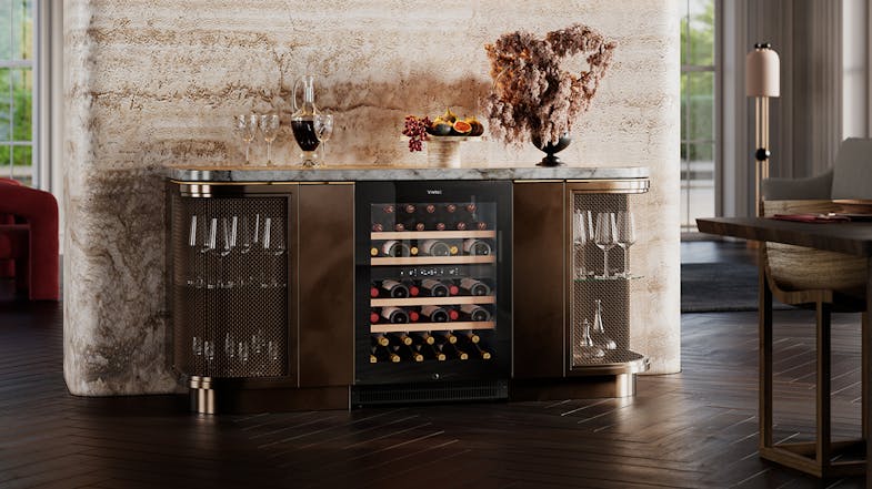 Vintec dual zone wine fridge integrated into a luxury home bar cabinet with marble countertops Vintec dual zone wine fridge integrated into a luxury home bar cabinet with marble countertops