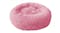 A round, fluffy, pink pet bed designed for small animals like cats or dogs. A round, fluffy, pink pet bed designed for small animals like cats or dogs.