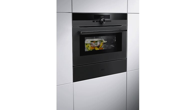 AEG 60cm Smart AI Built-In Compact Steam Oven with 24 Functions - Matte Black (NKB9A82KT) AEG 60cm Smart AI Built-In Compact Steam Oven with 24 Functions - Matte Black (NKB9A82KT)
