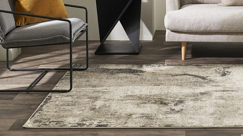 A close up view of the aurora rug in a contemporary living room setup A close up view of the aurora rug in a contemporary living room setup