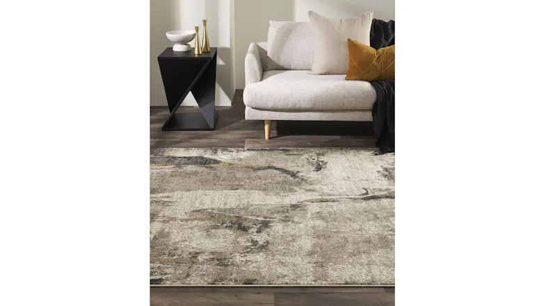 The aurora rug is staged beautiful in a modern living room The aurora rug is staged beautiful in a modern living room