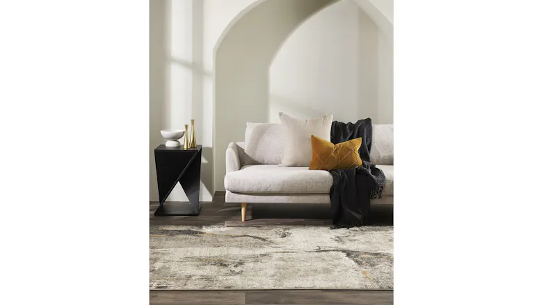 A view of a modern living room with the aurora rug placed beautifully on the floor A view of a modern living room with the aurora rug placed beautifully on the floor