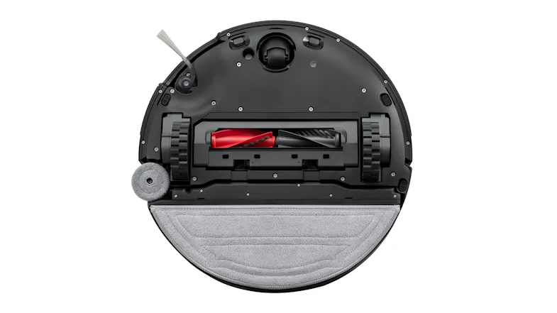 A view of an underside of a vacuum unit with the cover attached A view of an underside of a vacuum unit with the cover attached