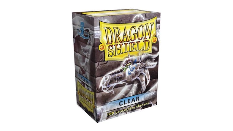A box containing 100 Dragon Shield protective card sleeves, in classic clear colour. A box containing 100 Dragon Shield protective card sleeves, in classic clear colour.
