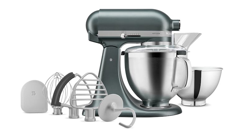 The KitchenAid stand mixer is shown together with bowls, whisk, beaters, and a hook. The KitchenAid stand mixer is shown together with bowls, whisk, beaters, and a hook.