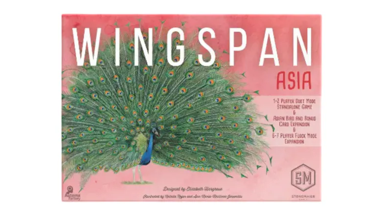Wingspan Asia board game box with a peacock illustration on a pink background. Wingspan Asia board game box with a peacock illustration on a pink background.