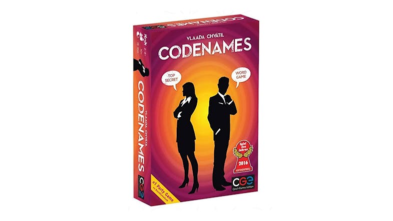 A silhouetted duo stands back-to-back on a vibrant box A silhouetted duo stands back-to-back on a vibrant box