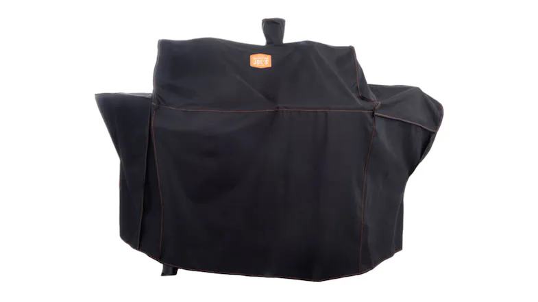 A black cover for Oklahoma Joe's Canyon Smoker and Charcoal Grill BBQ Combo A black cover for Oklahoma Joe's Canyon Smoker and Charcoal Grill BBQ Combo