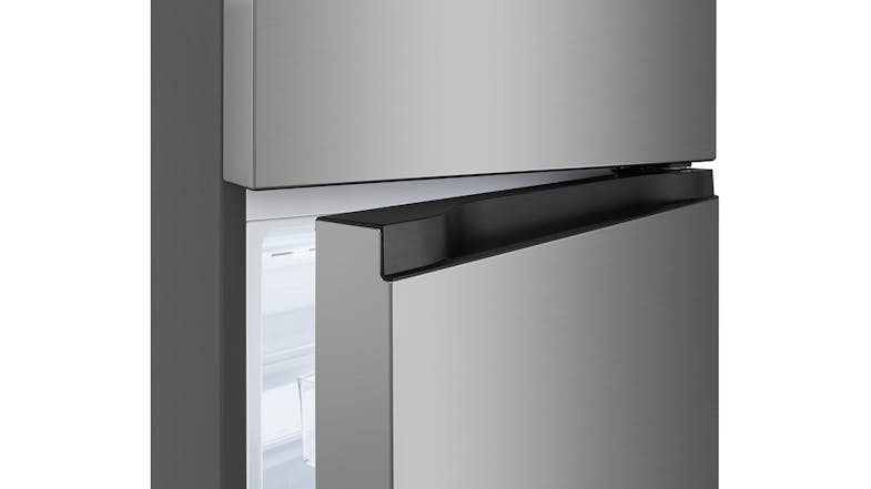 A close-up of a stainless steel refrigerator with a partially open fridge door A close-up of a stainless steel refrigerator with a partially open fridge door