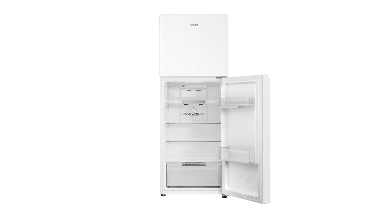 The refrigerator is showing an open fridge compartment with empty shelves The refrigerator is showing an open fridge compartment with empty shelves