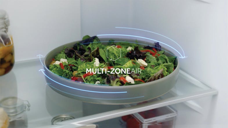 The fridge’s interior showing the MULTI-ZONE AIR feature and a fresh salad plate The fridge’s interior showing the MULTI-ZONE AIR feature and a fresh salad plate