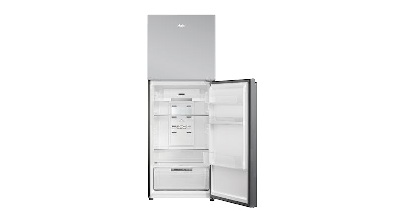 A sleek silver refrigerator with its fridge compartment open A sleek silver refrigerator with its fridge compartment open