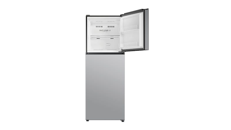 A top mount refrigerator with the freezer door open A top mount refrigerator with the freezer door open