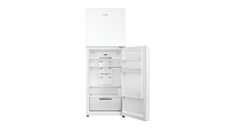 A sleek white refrigerator with its fridge compartment open A sleek white refrigerator with its fridge compartment open