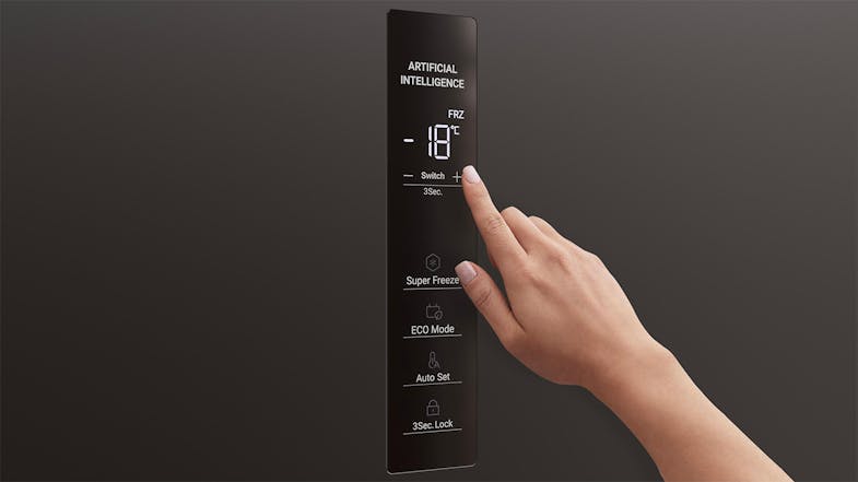 A person interacting with a freezer’s digital control panel A person interacting with a freezer’s digital control panel