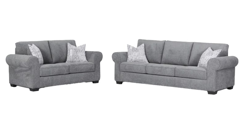 Two grey sofas, one large and one small, each styled with patterned throw pillows Two grey sofas, one large and one small, each styled with patterned throw pillows