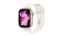 Apple Watch Series 11 in rose gold aluminium with light blush sport band displays a modern abstract watch face Apple Watch Series 11 in rose gold aluminium with light blush sport band displays a modern abstract watch face