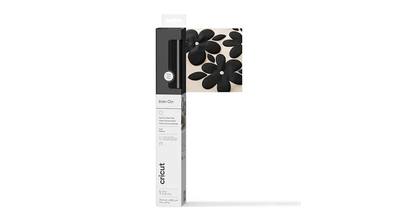 A box of vinyl sheet with a black floral sample design A box of vinyl sheet with a black floral sample design