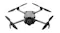 DJI drone in flight mode with extended arms and camera visible DJI drone in flight mode with extended arms and camera visible