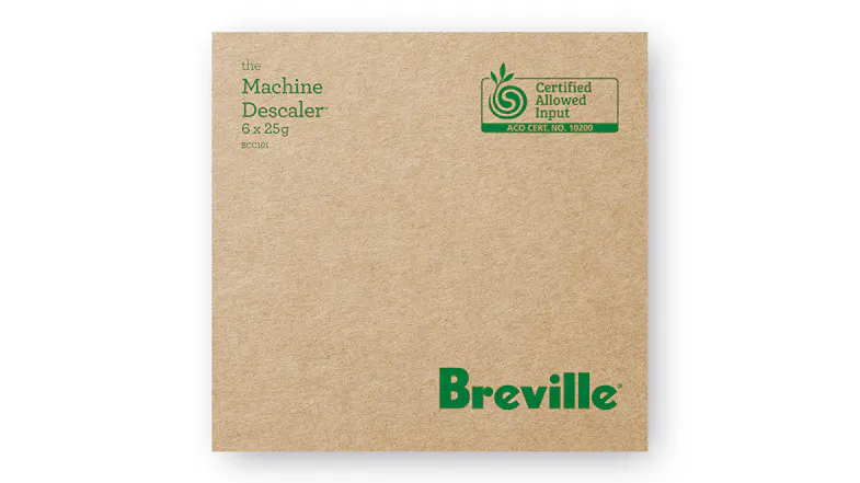 A brown cardboard box of Breville Machine Descaler A brown cardboard box of Breville Machine Descaler