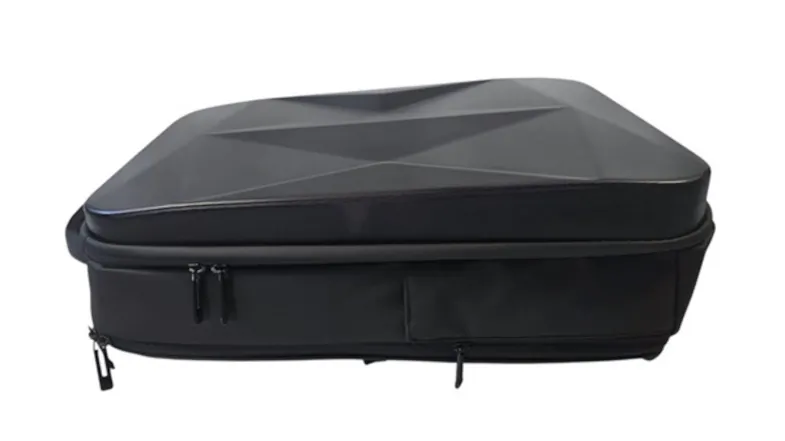 Black hard-shell suitcase with geometric top pattern and a multiple side zipper Black hard-shell suitcase with geometric top pattern and a multiple side zipper