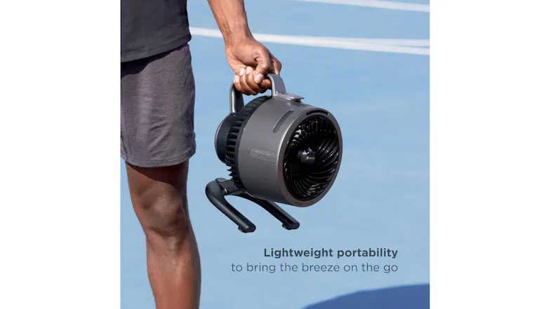A person holding the FlexBreeze fan with text that reads ‘Lightweight Portability’ A person holding the FlexBreeze fan with text that reads ‘Lightweight Portability’