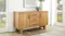 A view of a buffet table in a light and inviting dining room setup A view of a buffet table in a light and inviting dining room setup