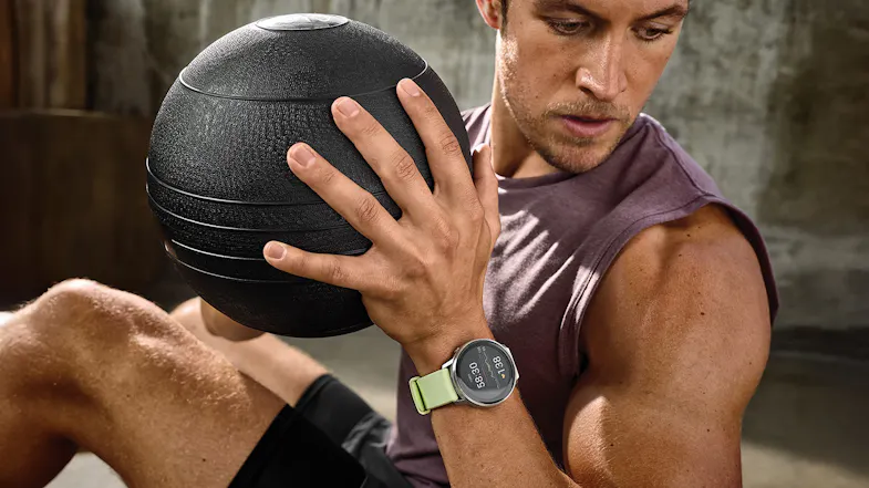 A person wearing a smartwatch during a workout A person wearing a smartwatch during a workout