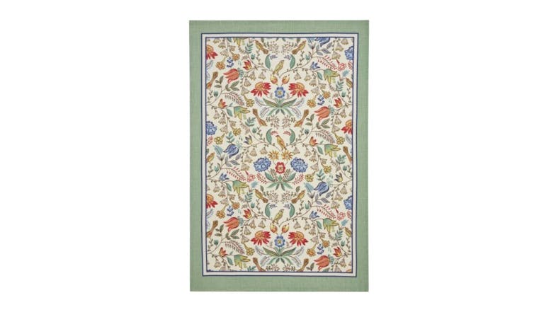 Cotton tea towel with a green border and intricate floral patterns in red, blue, and green on a cream background Cotton tea towel with a green border and intricate floral patterns in red, blue, and green on a cream background