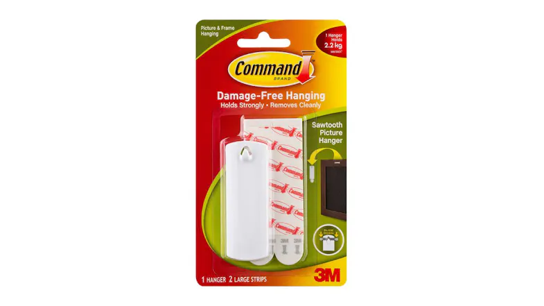 Packaging of the 3M Command Large Sawtooth Picture Hanger showing one white hanger and two adhesive strips Packaging of the 3M Command Large Sawtooth Picture Hanger showing one white hanger and two adhesive strips