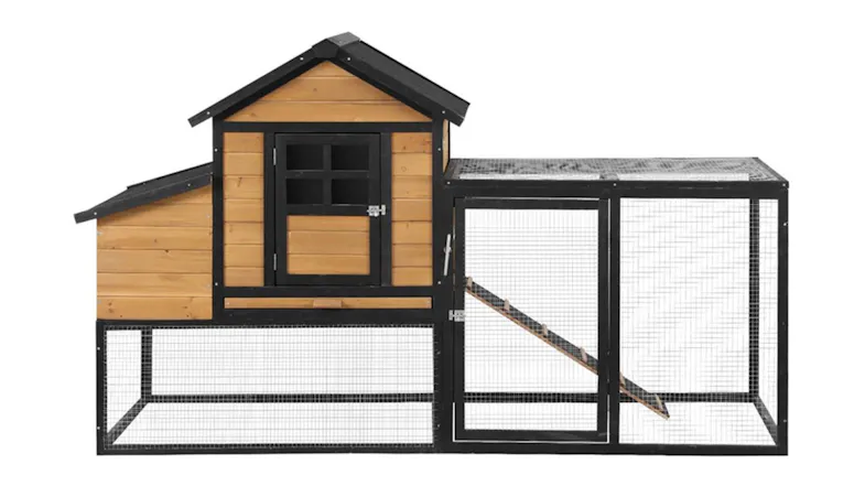 A front angle of the wooden chicken coop with black trim and wire mesh A front angle of the wooden chicken coop with black trim and wire mesh
