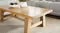A close-up view of the coffee table showcasing its beautiful pine timber finish A close-up view of the coffee table showcasing its beautiful pine timber finish