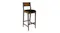 A padded bar chair positioned at a left angle A padded bar chair positioned at a left angle