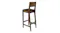 An angled back view of a classic wooden chair with a supportive backrest An angled back view of a classic wooden chair with a supportive backrest
