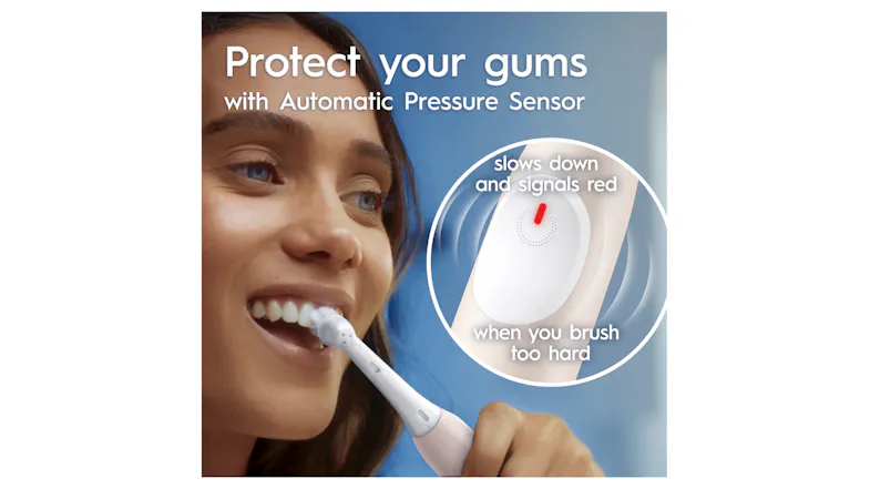 A person brushing teeth, showcasing an automatic pressure sensor A person brushing teeth, showcasing an automatic pressure sensor