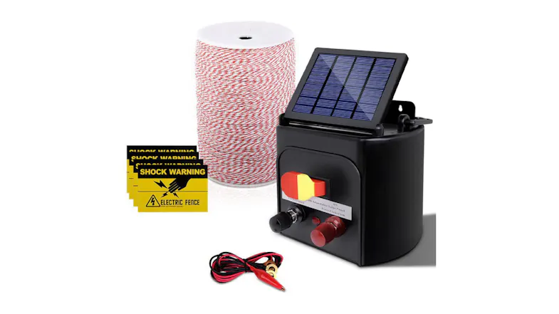 Solar-powered fence kit with red-white wire spool, warning signs, and connecting cables Solar-powered fence kit with red-white wire spool, warning signs, and connecting cables