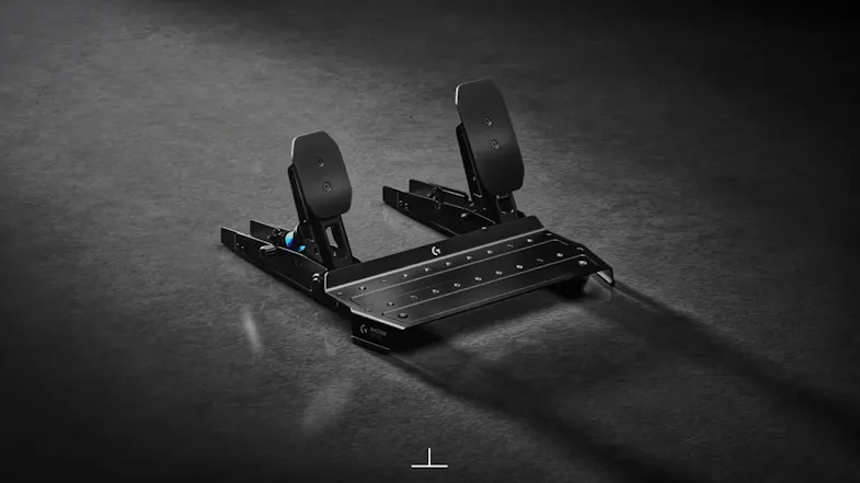 A view of the pedals positioned on a grey carpet A view of the pedals positioned on a grey carpet