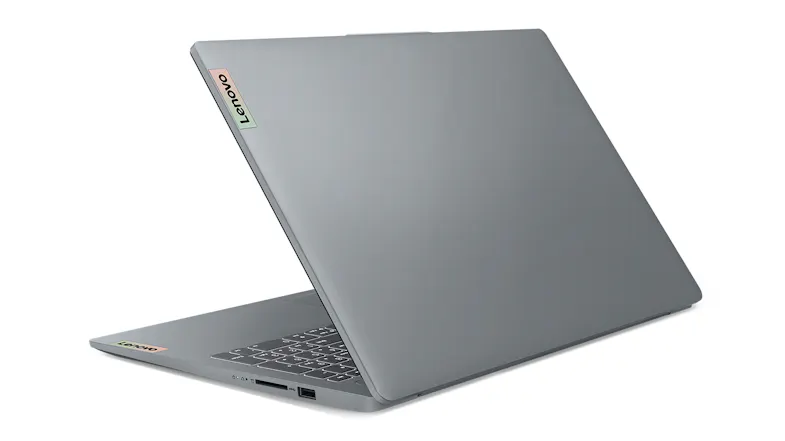 Left-side rear view of the partially open Lenovo 15.6" laptop showing vertical logo and ports Left-side rear view of the partially open Lenovo 15.6" laptop showing vertical logo and ports