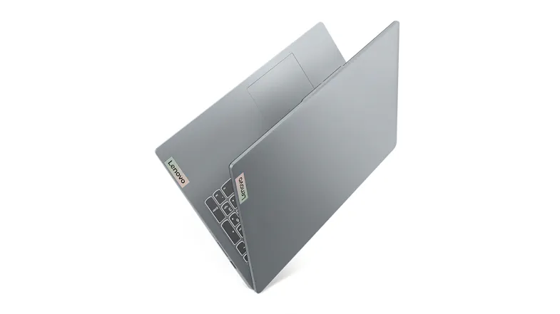 Angled view of the partially opened laptop showing numeric pad and touchpad Angled view of the partially opened laptop showing numeric pad and touchpad