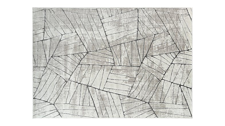 Rectangular rug with abstract geometric pattern in shades of beige with black lines. Rectangular rug with abstract geometric pattern in shades of beige with black lines.
