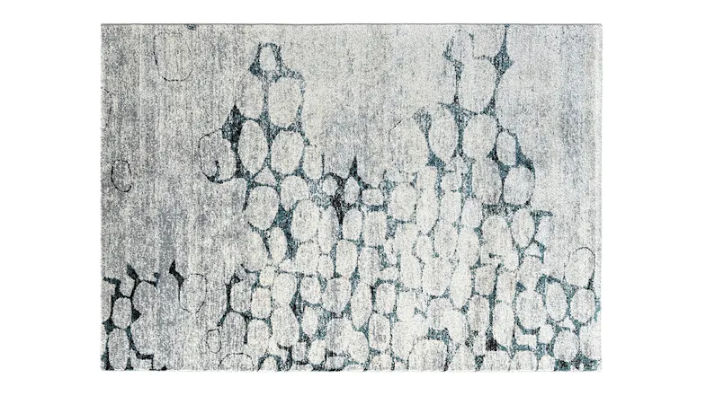 Rectangular blue rug with grey and white toned hexagonal patterns. Rectangular blue rug with grey and white toned hexagonal patterns.
