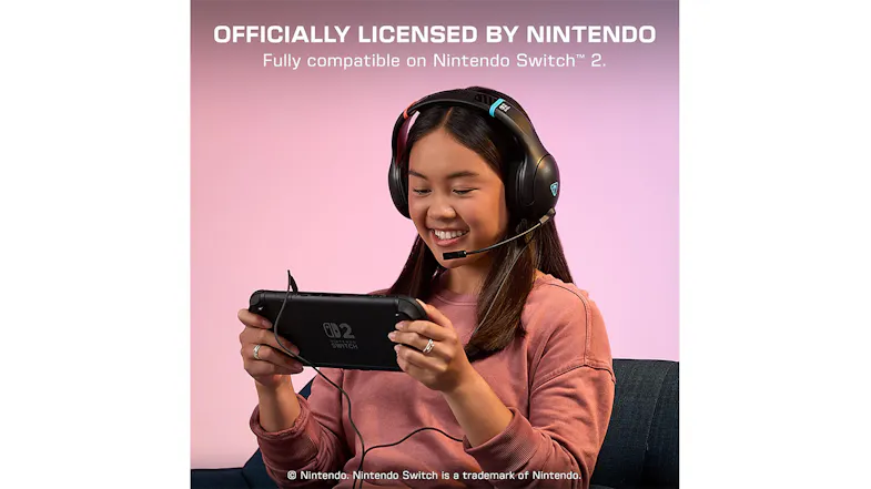 A person wears a licensed Turtle Beach gaming headset while holding a Nintendo Switch 2 A person wears a licensed Turtle Beach gaming headset while holding a Nintendo Switch 2