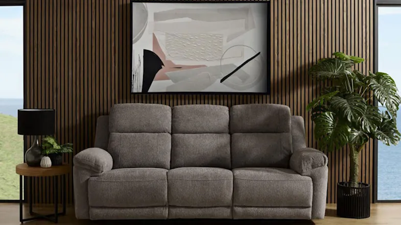 Brown Eathon Fabric 3 Seater Electric Recliner Sofa in a stylish living room with wooden panel walls Brown Eathon Fabric 3 Seater Electric Recliner Sofa in a stylish living room with wooden panel walls