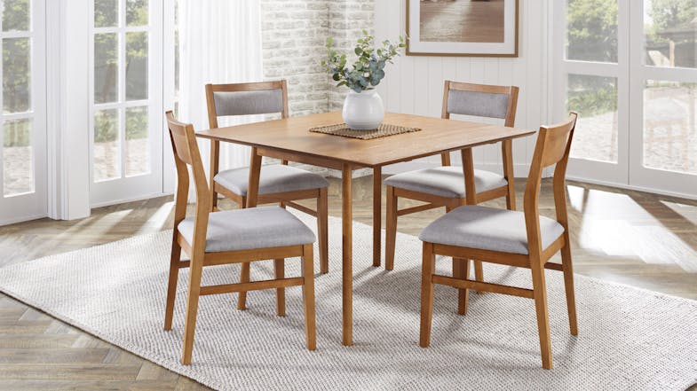 A simple wood dining suite with a minimalist design, featuring a square table and upholstered chairs. A simple wood dining suite with a minimalist design, featuring a square table and upholstered chairs.