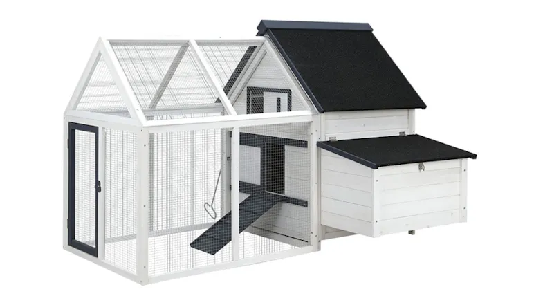 A right-angled view of a wooden pet coop A right-angled view of a wooden pet coop